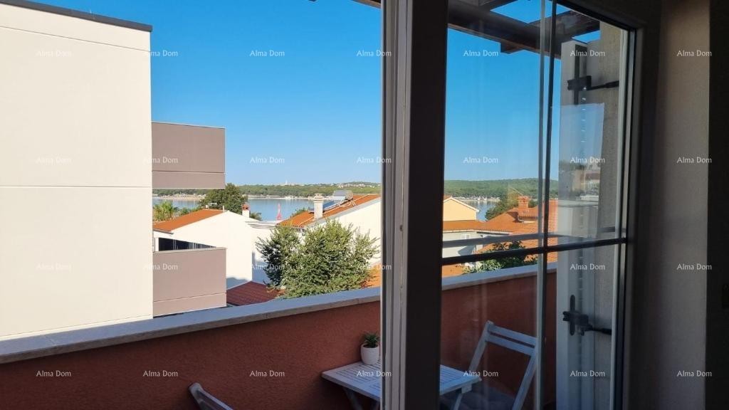 Excellent opportunity! Exclusive sale of an apartment in a prime location with a garden and parking space. Sea view! Pošesi, Medulin!! 4