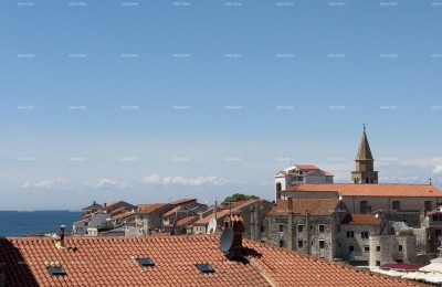 Prodaja stanov v stanovansko-poslovni stavbi s pogledom na morje, center Umaga! / S9a