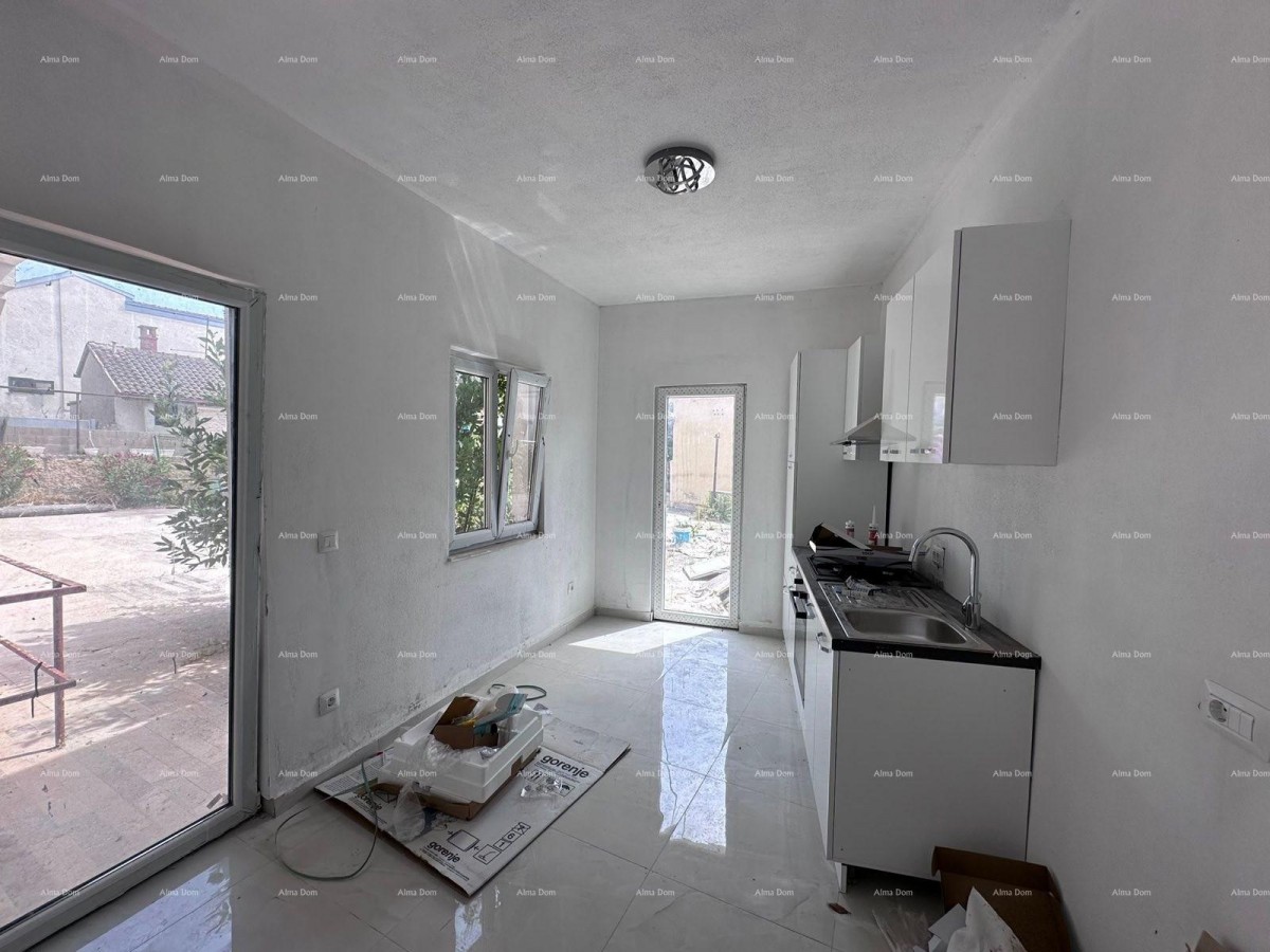 In vendita fantastica casa con tre appartamenti a Medulin! 24