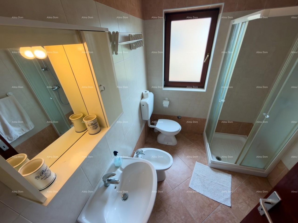 Novigrad, apartment in an attractive location with a pool. 24