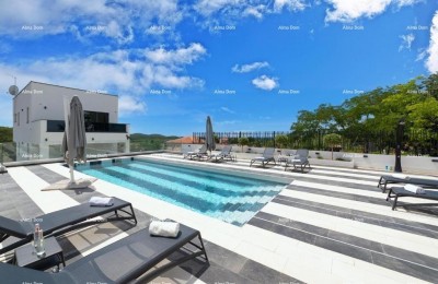 New, modern house with swimming pool.