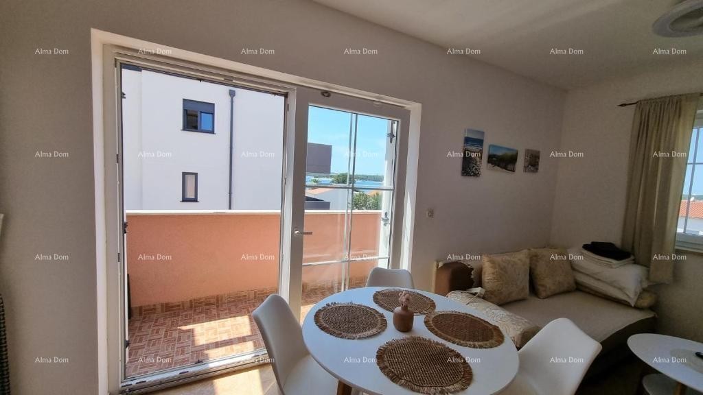 Excellent opportunity! PROPERTY WITH USAGE PERMIT. Exclusive sale of an apartment in a prime location with a garden and parking space. Sea view! Pošesi, Medulin!! 9