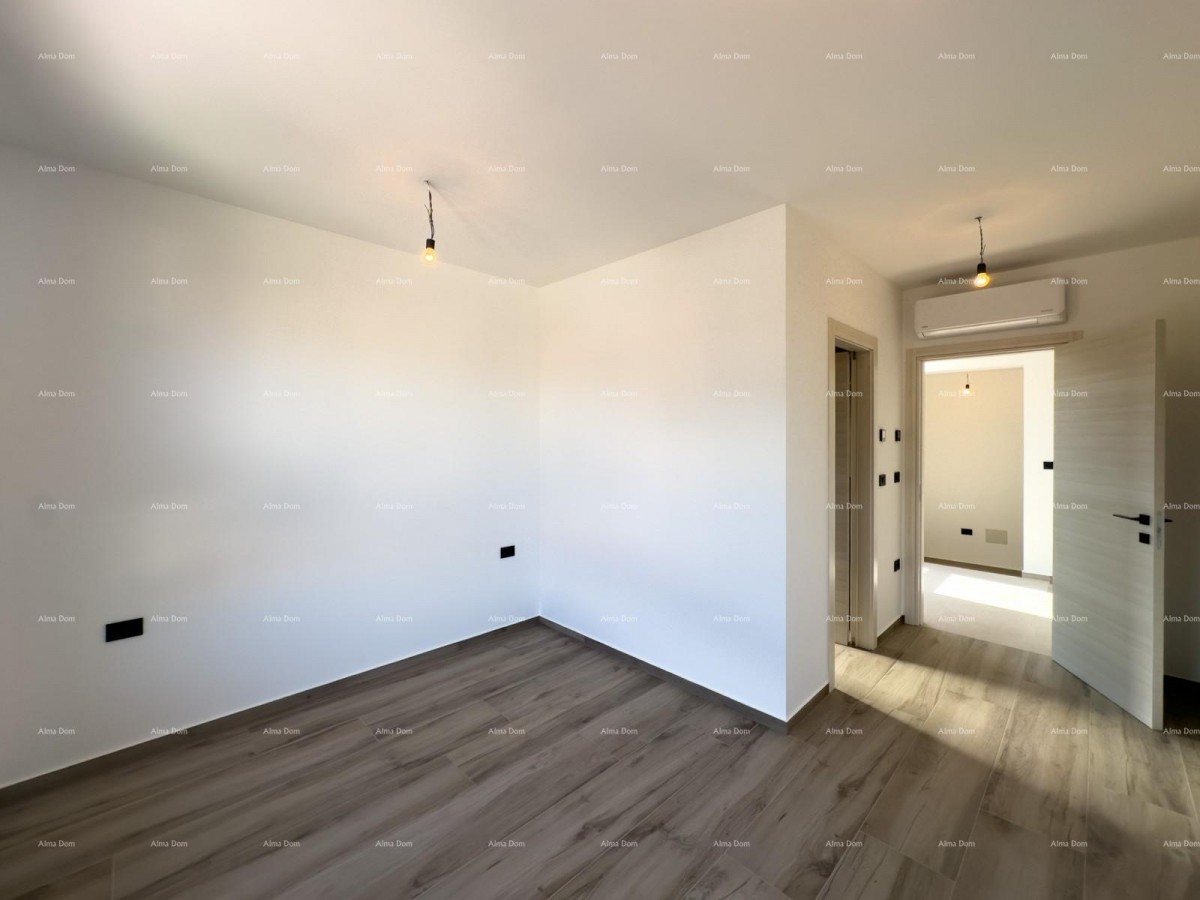 We are selling a semi-detached villa with a pool and a garage 26
