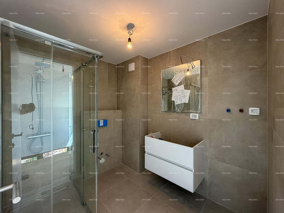 DVOETAŽNI APARTMA V CENTRU POREČA 18