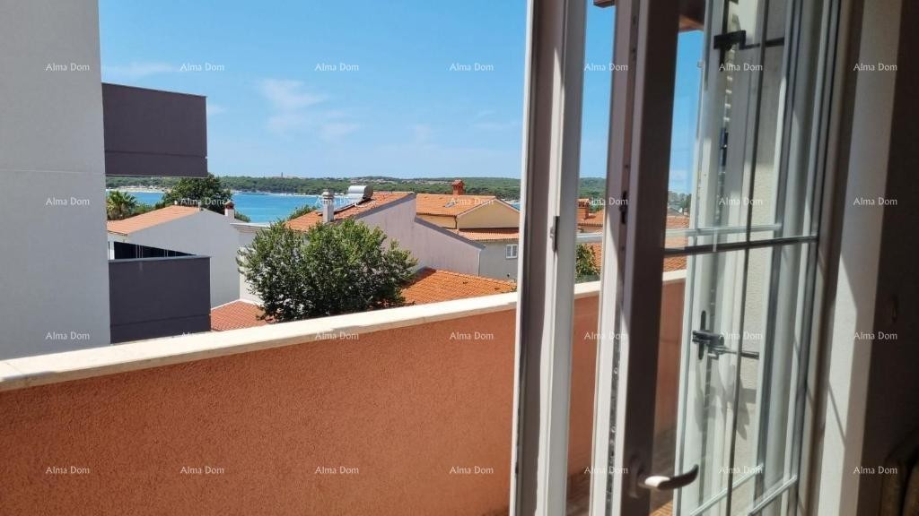 Excellent opportunity! PROPERTY WITH USAGE PERMIT. Exclusive sale of an apartment in a prime location with a garden and parking space. Sea view! Pošesi, Medulin!! 16