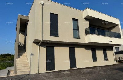 Luxury two-story apartment with a sea view and spacious terrace in Zambratija