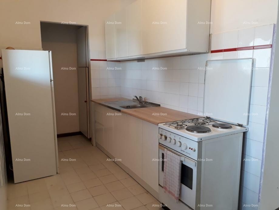Prodaja- kamena kuća u nizu, u centru Brtonigle! 13