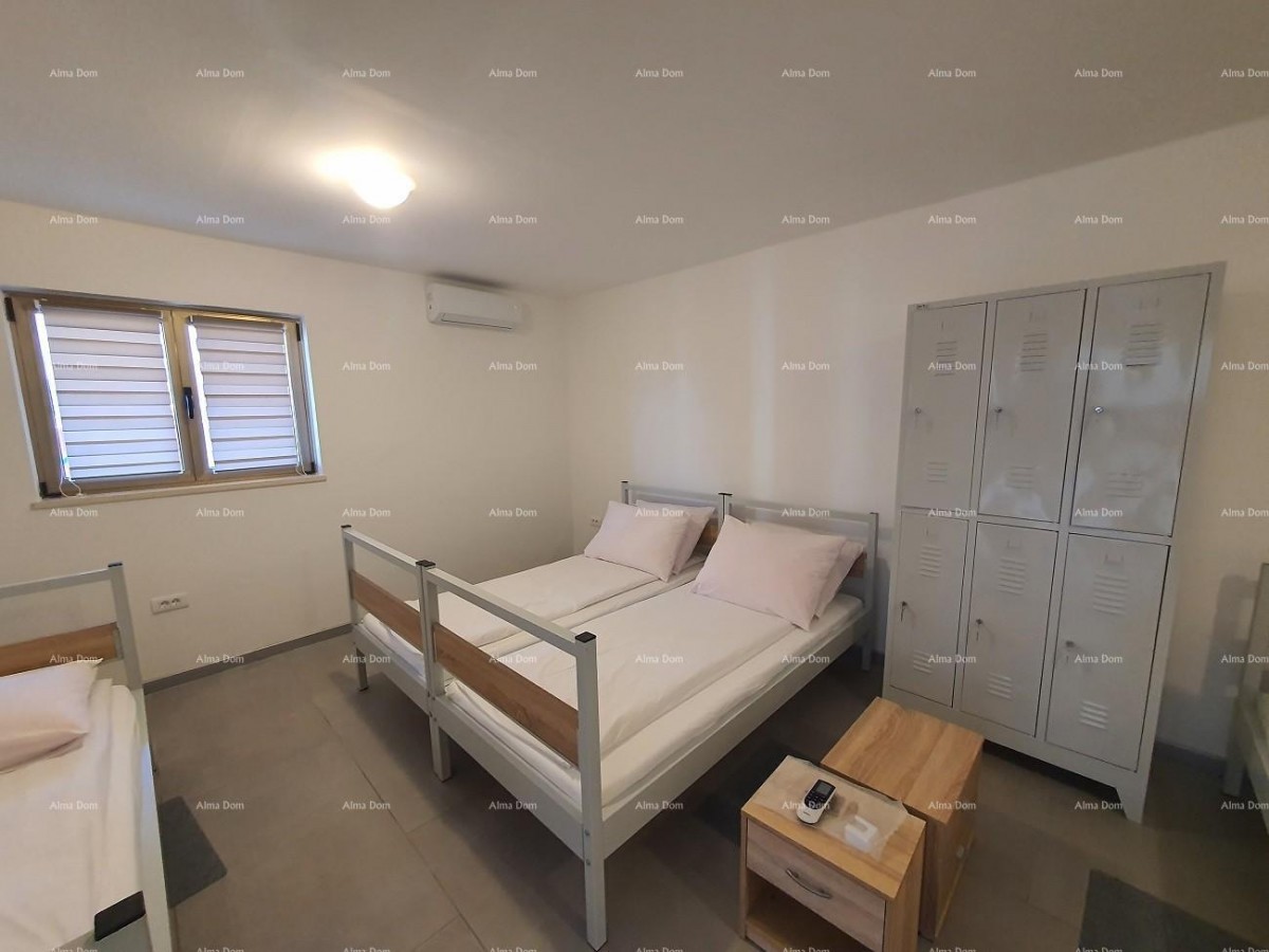 Labin  3-storey house with 3 apartments at a realistic price. 6