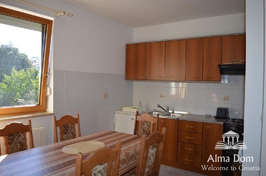 We are selling a house with five apartments in Medulin. 13