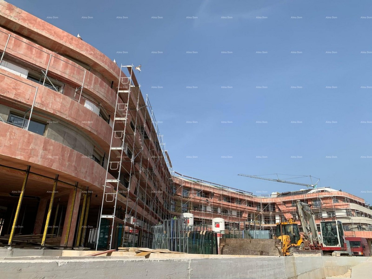 Poreč, residential and commercial building under construction with apartments and underground garages 11