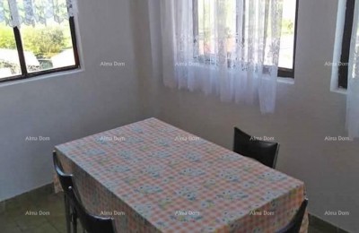 Vendita di un appartamento in condominio in casa familiare, Umago