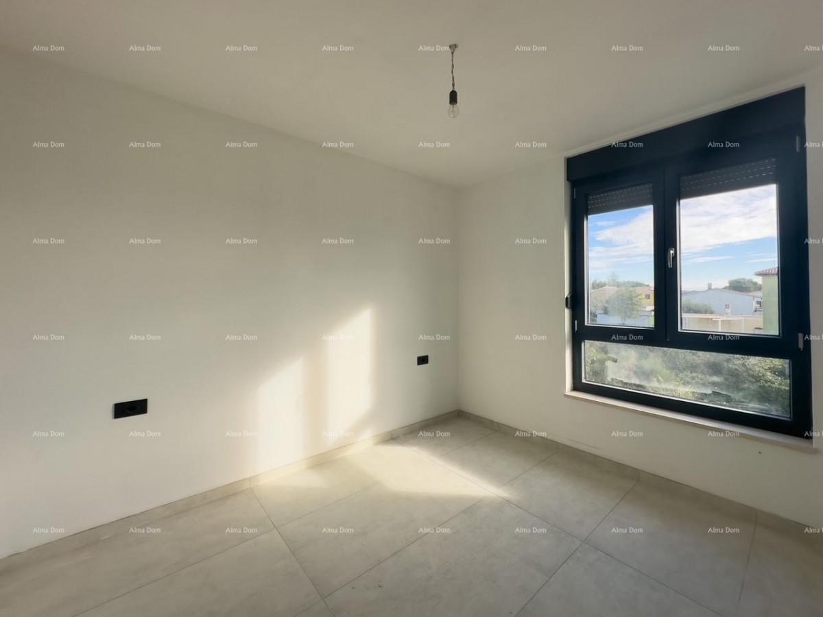 We are selling an apartment in a new building in Banjole. 11